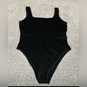 OQQ Black Ribbed Square Neck Bodysuit: The Viral TikTok Sensation!